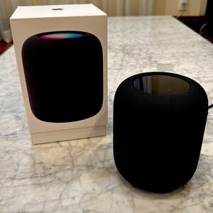 Apple Black Portable Speaker with Modern Design